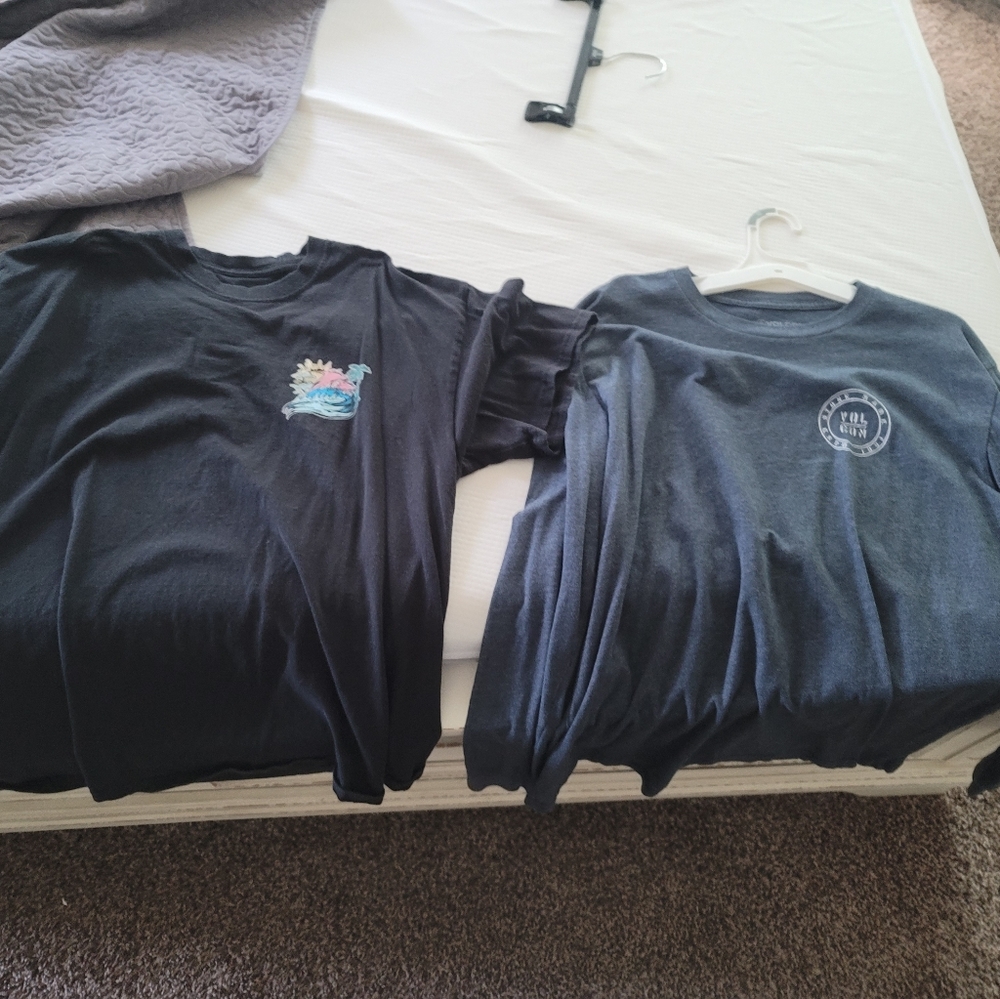 Volcom shirt, pink dolphin shirt.